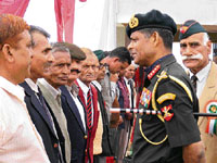 The Artrac chief, Lt-Gen J.K. Mohanti, interacts with war veterans at Bilaspur on Tuesday.