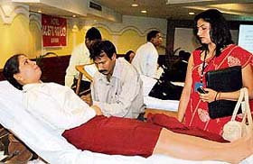 Volunteers donate blood at a camp organised by the CMCH in Ludhiana