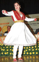 A girl gives a performance at the inauguration of the golden jubilee celebrations of the Dairy Science College at the NDRI auditorium in Karnal on Wednesday.