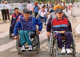 Physically challenged persons come to watch the T-20 cricket match between the Congress and the Akali Dal in Mohali