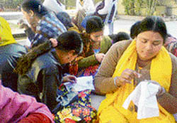 Village girls attend classes in embroidery at DAV Girls College, Yamunanagar.