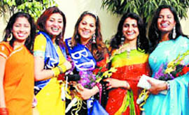 Miss BD Arya College, Sapna, flanked by other contestants during a farewell party in Jalandha