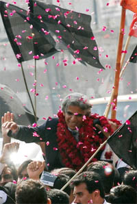 Lawyers greet recently released anti-Musharraf lawyer Ali Ahmed Kurd during a rally in Lahore on Thursday.