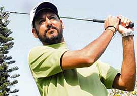 Harjinder Singh Kang goes for a big hit as he ties for the first place on the first day of the Punjab Golf Championship at the Chandigarh Golf Club on Friday.