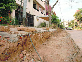 The widening of roads in Sector 44 is forcing residents to either keep their vehicles inside their houses or park them on the roads during the night. 