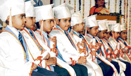 Young graduates with their degrees during the graduation ceremony organised by Sat Paul Mittal School