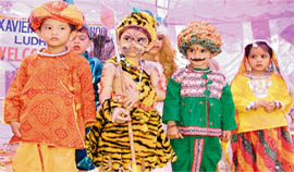 students of St Xavier School await their turn to perform during the annual function in Ludhiana 