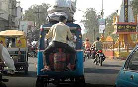 A man out on a joyride sitting atop an LPG cylinder in Ambala on Sunday.