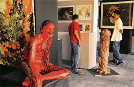 Visitors at the annual art exhibition in Government College of Arts, Chandigarh, on Sunday.