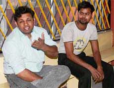 Anil Jain and Devinder Singh at the Sector 31 police station in Chandigarh on Sunday.