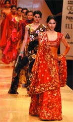 Models showcase Swapan and Seema's creations on the last day of the WIFW at Pragati Maidan in the Capital on Sunday