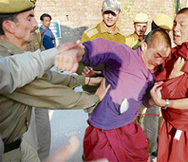 Protesting Tibetan youths clash with the police on The Mall in Shimla on Sunday.