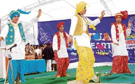 Students of Sacred Heart Senior Secondary School present Bhangra during the annual day function in Mandi Gobindgarh on Saturday