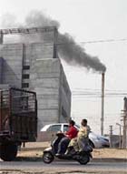 Chimney of a dyeing company billows out thick smoke in Ashok Nagar in Ludhiana. 