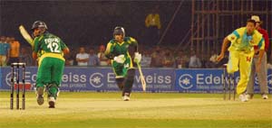Lahore Badshahs Imran Farhat and Humayun Farhat, who shared a 101-run partnership, run between the wickets during their match against Chandigarh Lions in the ICL Edelweiss 20s challenge at Tau Devi Lal Stadium in Panchkula on Sunday.