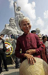 A My Lai massacre survivor shows her emotion during the 40th anniversary of the massacre in My Lai, Quang Ngai province, central Vietnam, on Sunday.
