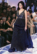 Actress Katrina Kaif displays a creation by Anamika Khanna and Ashish Soni at the grand finale of the Wills Lifestyle India Fashion Week in New Delhi late on Sunday.