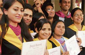 Students in a jubilant mood after they get their degrees during a convocation function held at Government College, Sector 11, in Chandigarh on Monday