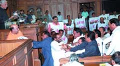 BJP MLAs indulge in sloganeering during the Lt Governor Tejendra Khannas Budget address to the Vidhan Sabha in Capital on Monday.