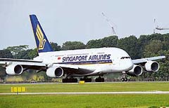 A Singapore Airlines Airbus A380 speeds up along the run way during its take off from Changi International Airport in Singapore on Tuesday.