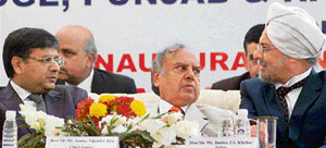 Chief Justice of Panjab and Haryana High Court Justice Vijender Jain (centre), Justice M.M. Kumar (left), and Justice J.S. Khehar in Mohali on Tuesday.