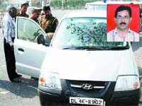 The Noida police investigate the murder of Steel Authority of India asst manager, Rajendra Kumar Anand (inset), who was shot at Noida on Tuesday