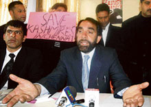 Kashmir High Court Bar Association president Nazir Ahmad Ronga addresses a press conference in Srinagar on Tuesday.