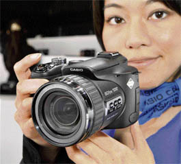 A Casio employee displays the world's fastest-shooting digital camera at the Photo Imaging Expo in Tokyo on Wednesday. It shoots 60 images per second at 6.0-mega pixel resolution. The camera, featuring a 7.3-87.6mm/F2.7-4.6 zoom lens (x12) equivalent to a 36-432mm in 35mm camera, will go on sale from March 28.