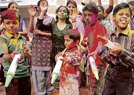 Special kids of Vatika High School celebrate Holi in Chandigarh on Wednesday.