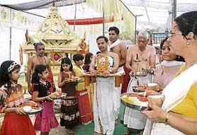 Devotees take part in Murti Sthapana ceremony during the 17th Pratishtha Day at Sree Ayyappa temple in Sector 47, Chandigarh, on Wednesday. 