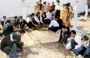 Students of R.S. Model Senior Secondary School plant medicinal saplings in Ludhiana on Wednesday.