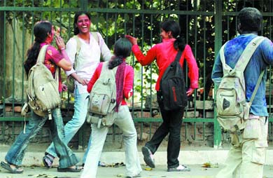 Medical college students play Holi in the Capital on Thursday. 