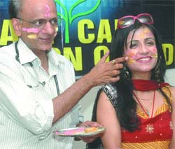 Dr. K. K. Aggarwal, president, Heart Care Foundation of India with singer Shabani Kashyap at a Holi function in the Capital on Thursday.