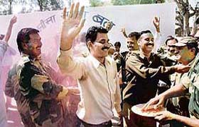 BSF jawans deployed at the Suchetgarh border celebrate Holi with residents of the area