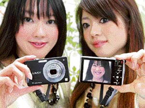 Japanese electronics giant Matsushita Electric Industrial unveils digital camera "Lumix FX-500" at the Photo Imaging Expo in Tokyo on Thursday. 