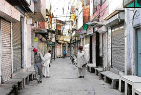 Traders closed their shops following a protest against house tax at Kharar on Friday.