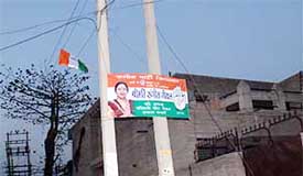 A banner of a Congress candidate put up on electricity poles in violation of rules during campaigning for municipal committee elections in Panchkula.