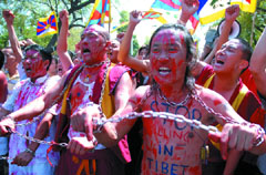 Tibetans demand freedom in the Capital on Friday.