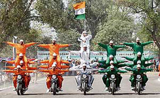 Dare devils show their expertise in balancing their bodies on moving motor cycles during the passing out parade of the Maharaja Ranjit Singh Punjab Police Academy at Phillaur on Friday.