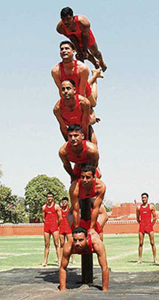 Police recruits display rare control in striking a balance during malkham show during the passing out parade of the Maharaja Ranjit Singh Punjab Police Academy at Phillaur on Friday.