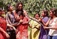 Government College students celebrate Holi on the college premises in Ludhiana on Friday.