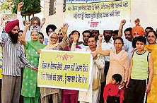 Members of the Punjab Networking for Positive People (PNPP) takes out an awareness rally in Ludhiana on Friday.