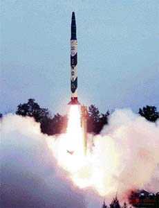 A medium-range nuclear-capable ballistic Agni-1 missile blasts off Dhamra, an island off the coast of Orissa