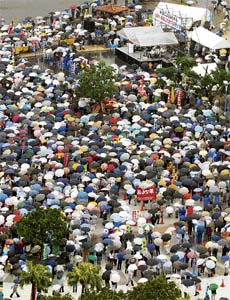 Thousands of Okinawans rally in Chatan town to protest against crimes committed by US troops and demand a smaller US military presence on the southern Japanese island of Okinawa