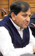 Union minister of state for communication and information technology Shakeel Ahmed speaks to mediapersons at Shimla on Monday.