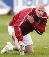 England's David Beckham attends a team training session in London Colney, north of London on Monday.