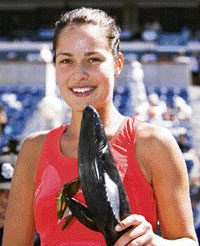 Ana Ivanovic of Serbia holds the Pacific Life Open trophy after defeating Russia's Svetlana Kuznetsova in the final in Indian Wells on Sunday.