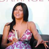 Actress Sushmita Sen gestures during a Pantene Hair beauty event at a press conference in the Capital