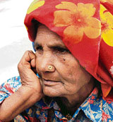 Kasturi (80) of Raipur Jattan village awaits her turn to get herself examined during a health mela held at the civil hospital, Karnal, on Tuesday.