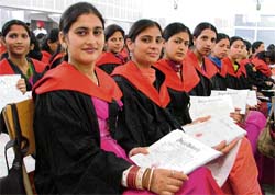 Jubilant students of BCM College of Education with their degrees in Ludhiana on Tuesday.
